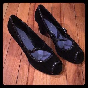 Suede peep toe pumps.